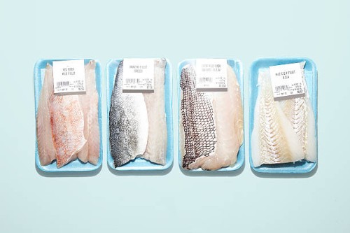 packaged fresh fish - food stock pictures, royalty-free photos & images