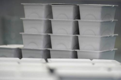 Packaging made from recycled papaer cups using the COLOURFORM process is displayed at James Cropper recycling plant on April 17, 2018 in Kendal,...