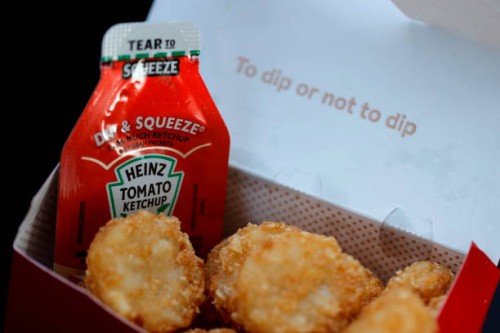 Packet of Heinz ketchup is displayed with Chick-fil-A hash browns on April 12, 2021 in Novato, California. Packets of ketchup are in short supply as...