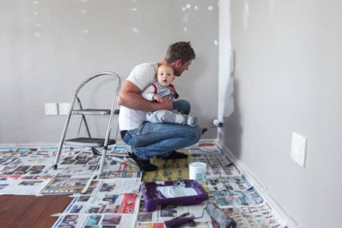 painting the playroom with baby. - home decoration stock pictures, royalty-free photos & images