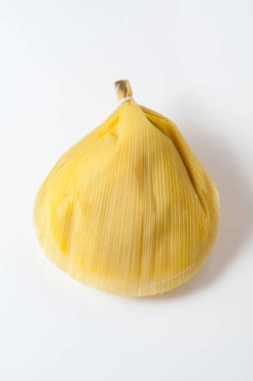 pamonha isolated on white background - junk food stock-fotos und bilder