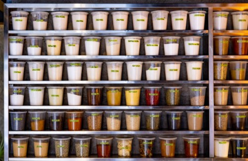 pantry of spices in a commercial kitchen at a restaurant - food stock pictures, royalty-free photos & images