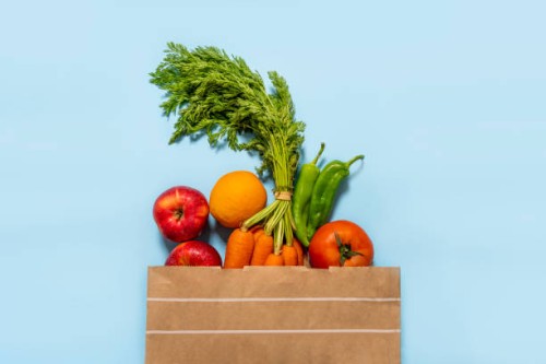 paper bag full of fruits and vegetables - food stock pictures, royalty-free photos & images