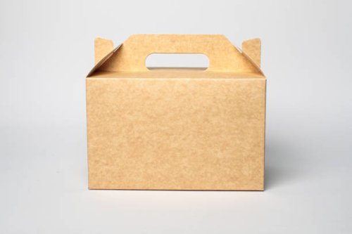 paper container, brown carton on white background. recyclable packaging - junk food stock pictures, royalty-free photos & images
