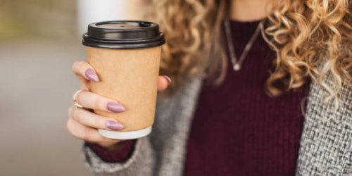 paper cup in hand - junk food stock pictures, royalty-free photos & images