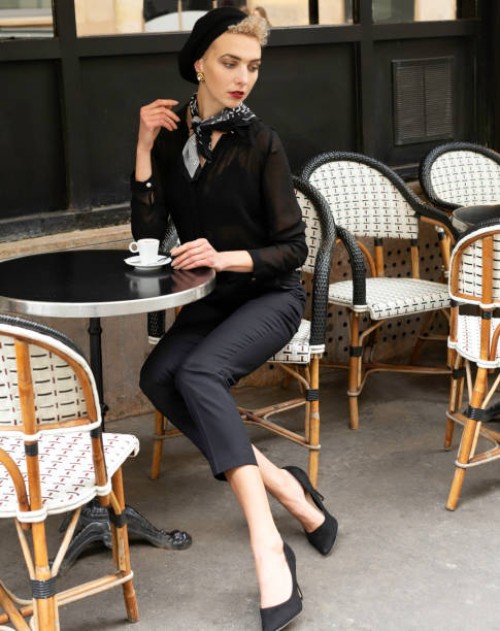 paris, france - portrait of a young woman sitting at the terrace of a parisian cafe - fashion stock pictures, royalty-free photos & images
