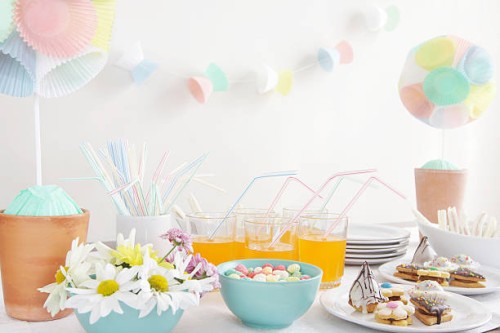 party table with daisies, cupcake liner topiary and garlands - home decoration stock pictures, royalty-free photos & images