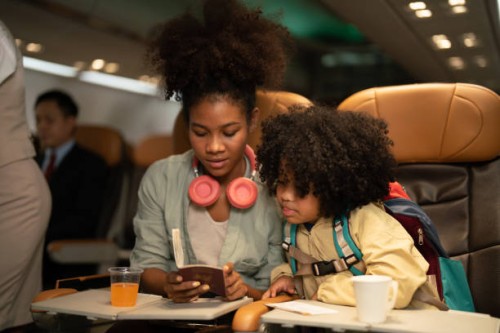 passengers women and children traveling on planes. - travel stock pictures, royalty-free photos & images