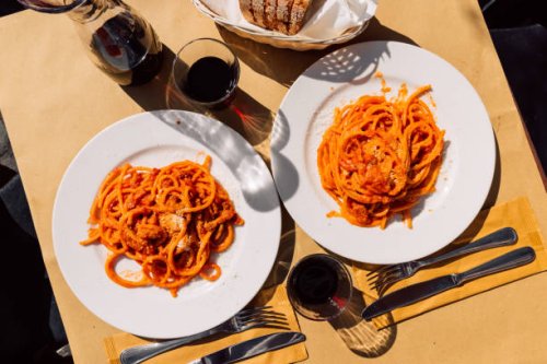 pasta amatriciana served in italian restaurant in rome, italy - food stock pictures, royalty-free photos & images