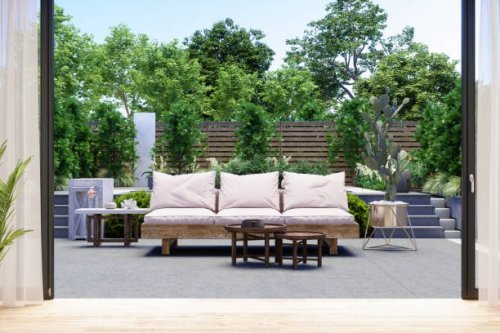 patio with sofa, coffee table, cactus plant and garden view background. - garden decoration stock pictures, royalty-free photos & images