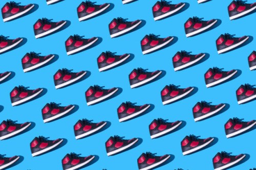 pattern of black and red basketball sneakers, on a blue background. concept for sneaker, basketball, retro, fashion, collection and casual - fashion stock pictures, royalty-free photos & images