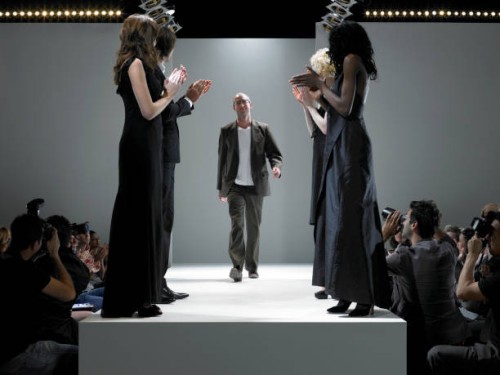 people applauding fashion designer on catwalk - fashion stock pictures, royalty-free photos & images