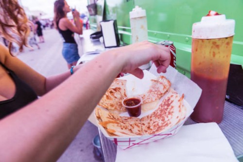 people eating out from food trucks at hialeah florida - junk food stock pictures, royalty-free photos & images