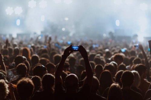 people recording a rock concert with their cell phones - concert stock pictures, royalty-free photos & images