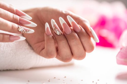 perfectly prepared gel nails decorated with diamonds. - nails art stock pictures, royalty-free photos & images