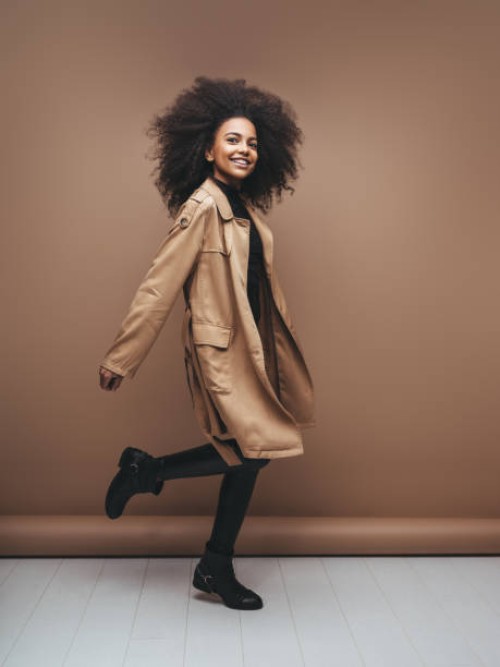 photo of cheerful curly afro girl with positive emotions - fashion stock pictures, royalty-free photos & images