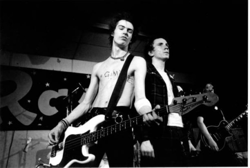 Photo of Johnny ROTTEN and Sid VICIOUS and SEX PISTOLS, Sid Vicious & Johnny Rotten performing live onstage at Randy's Rodeo Nightclub, San Antonio,...