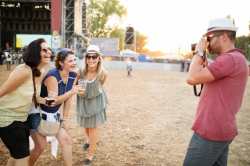 photographing at summer festival - concert stock pictures, royalty-free photos & images