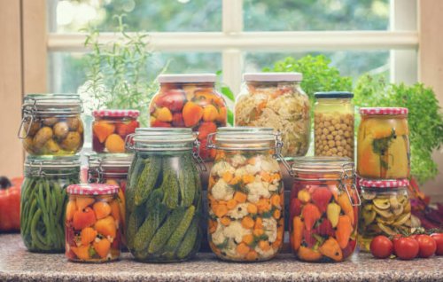 pickled organic vegetables in jars - food stock pictures, royalty-free photos & images