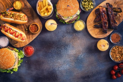 picnic table to celebrate 4th of july - junk food stock pictures, royalty-free photos & images