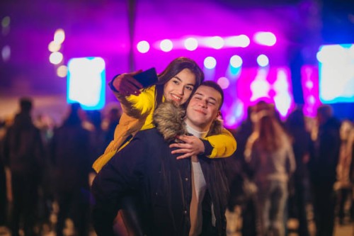 piggyback ride on a music festival - concert stock pictures, royalty-free photos & images