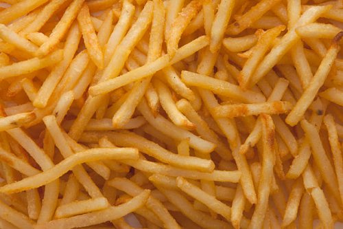 pile of french fries - junk food stock pictures, royalty-free photos & images