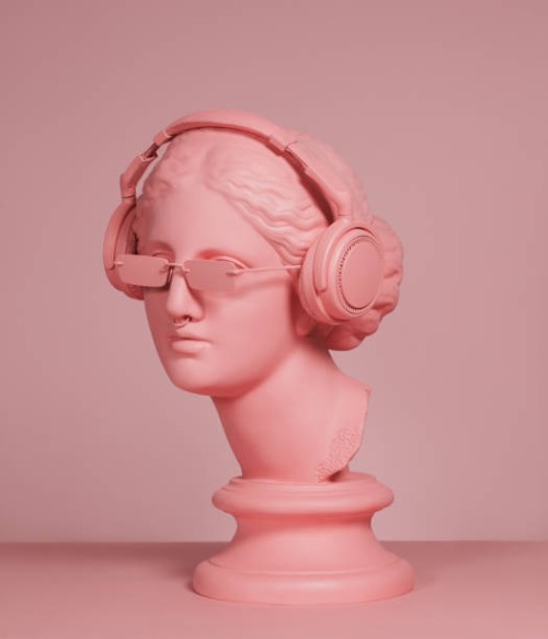 pink colored modern greek goddess with headphones - fashion stock pictures, royalty-free photos & images