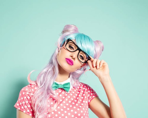 pink hair manga style girl holding nerd glasses - fashion stock pictures, royalty-free photos & images