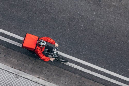 pizza delivery guy on bicycle - food stock pictures, royalty-free photos & images