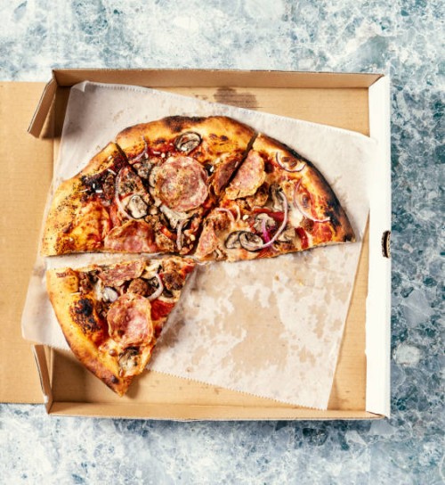 pizza in a box on gray, stone background - junk food stock pictures, royalty-free photos & images