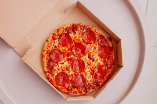 pizza with pepperoni in box - junk food stock pictures, royalty-free photos & images