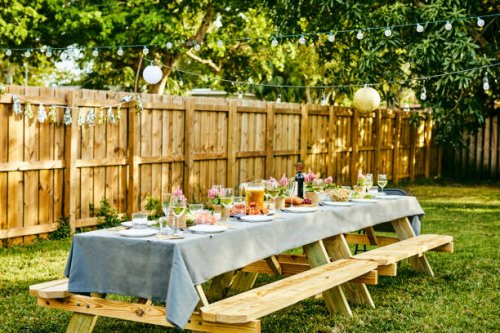 place setting on dining table in back yard - garden decoration stock pictures, royalty-free photos & images