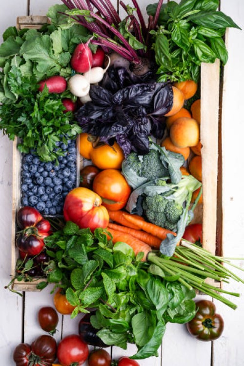 plant based food, fresh organic fruits, berries, vegetables, and herbs in wooden box, high angle view - food stock pictures, royalty-free photos & images