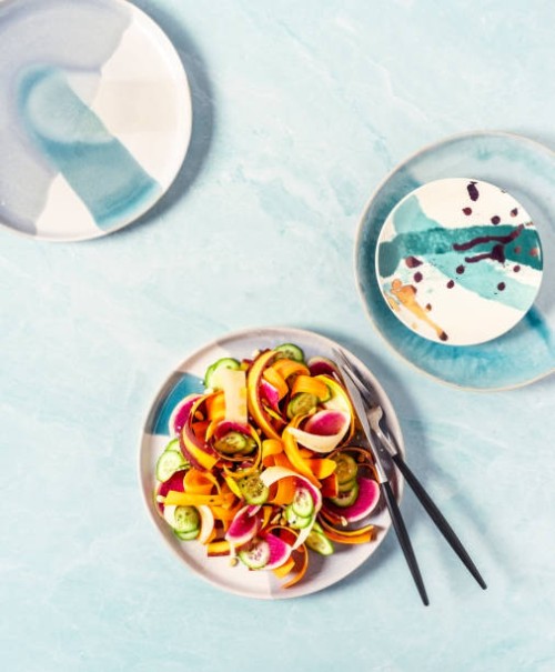 plate of fresh salad on blue background - food stock pictures, royalty-free photos & images