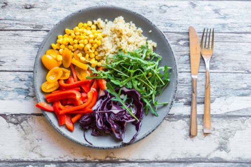 plate of rainbow salad with bulgur, rocket and different vegetables - junk food stock pictures, royalty-free photos & images