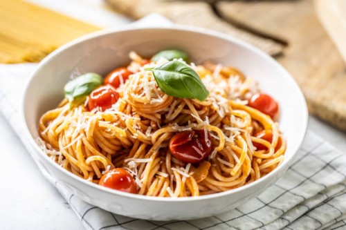 plate with spaghetti in tomato sauce, parmesan cheese and basil. - food stock pictures, royalty-free photos & images