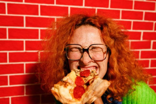 playful pizza moment - junk food stock pictures, royalty-free photos & images