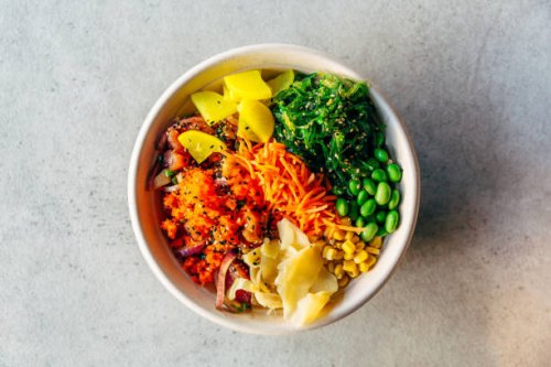 poke bowl with tuna, salmon, edamame beans, wakame chuka seaweed, corn, carrot - junk food stock pictures, royalty-free photos & images