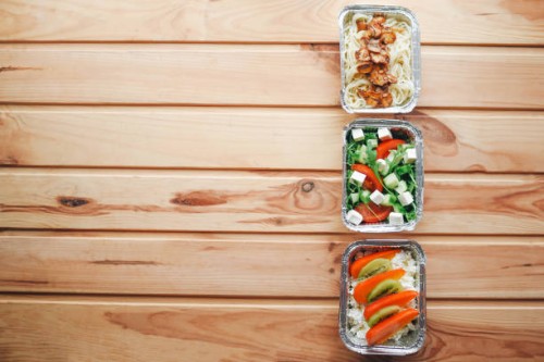 portion food in foil disposable containers. - junk food stock pictures, royalty-free photos & images