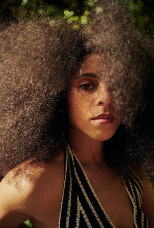 portrait of a beautiful woman with afro hair. stock photo - fashion stock pictures, royalty-free photos & images
