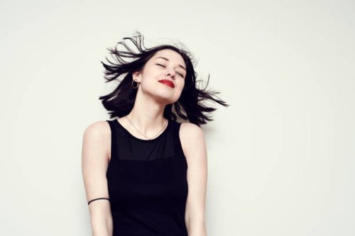 portrait of a carefree young woman - hairstyle stock pictures, royalty-free photos & images