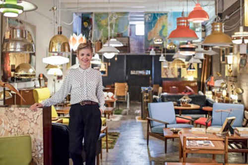 portrait of a female business owner standing in her furniture store - home decoration stock pictures, royalty-free photos & images