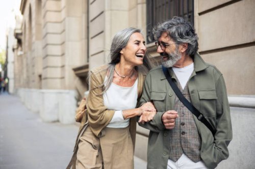 portrait of a happy mature couple having a fun vacation - travel stock pictures, royalty-free photos & images