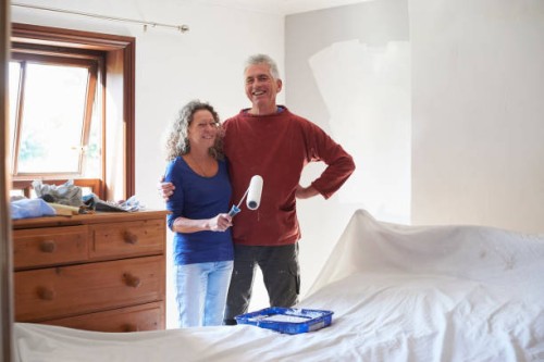 portrait of a mature couple - home decoration stock pictures, royalty-free photos & images