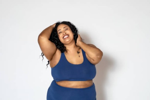 portrait of a plump woman in lingerie - fashion photos et images de collection