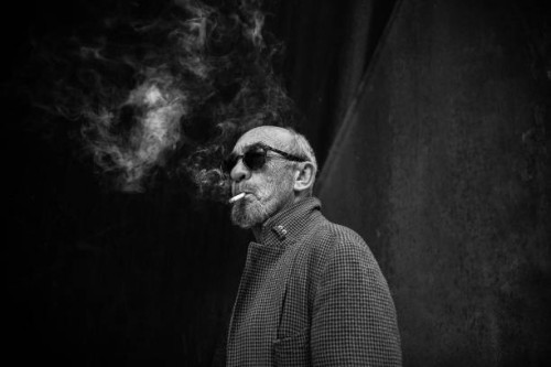 portrait of a smoking man. - fashion stock pictures, royalty-free photos & images