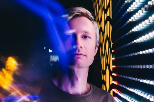 portrait of a young handsome man in neon light. - fashion stock pictures, royalty-free photos & images