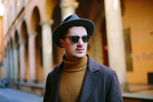 portrait of a young man in hat and sunglasses - fashion stock pictures, royalty-free photos & images