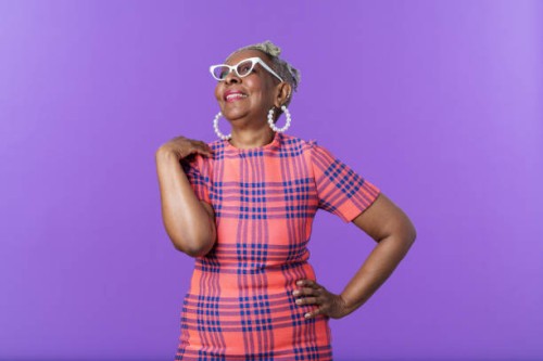 portrait of african american confident woman smiling - fashion stock pictures, royalty-free photos & images