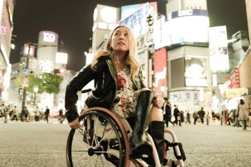 portrait of asian woman has a wheelchair solo travel in the night - fashion stock pictures, royalty-free photos & images